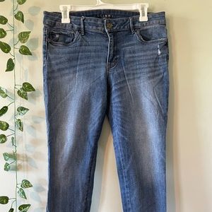 Jeans with a beaded patchwork on the ankles.